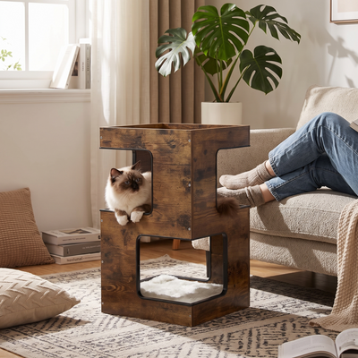 Nook wooden cat condo house bed in a lived-in living room with a cat settling inside
