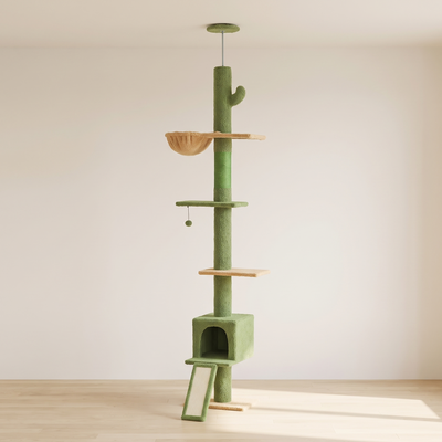 Saguaro cactus cat tower in a minimal room against a warm off-white wall