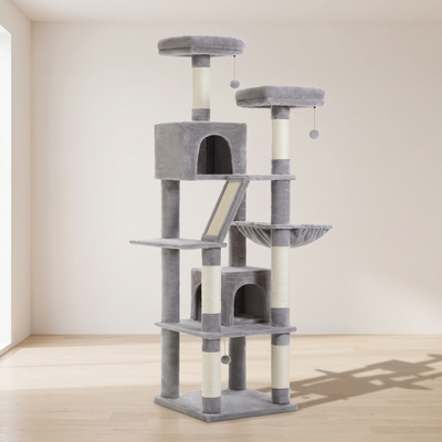 Strata multi level cat tree tower in a minimal room against a warm off-white wall